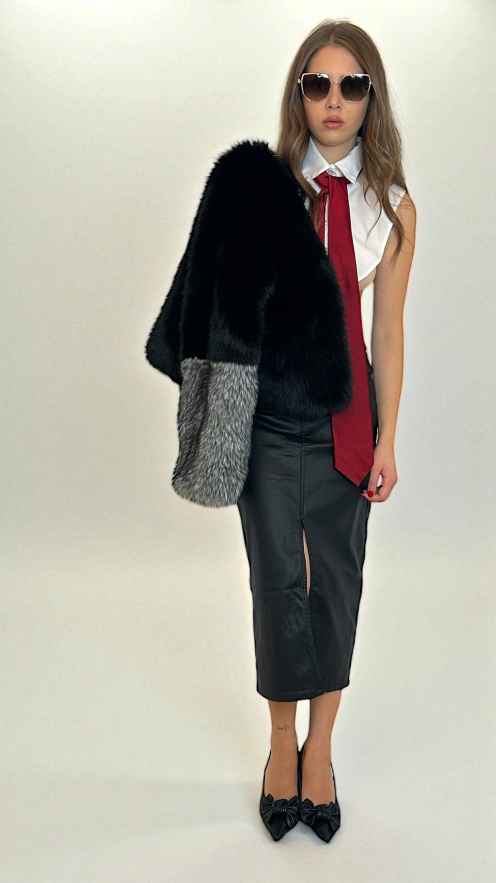 Gonna midi nera Eco-pelle  con spacco